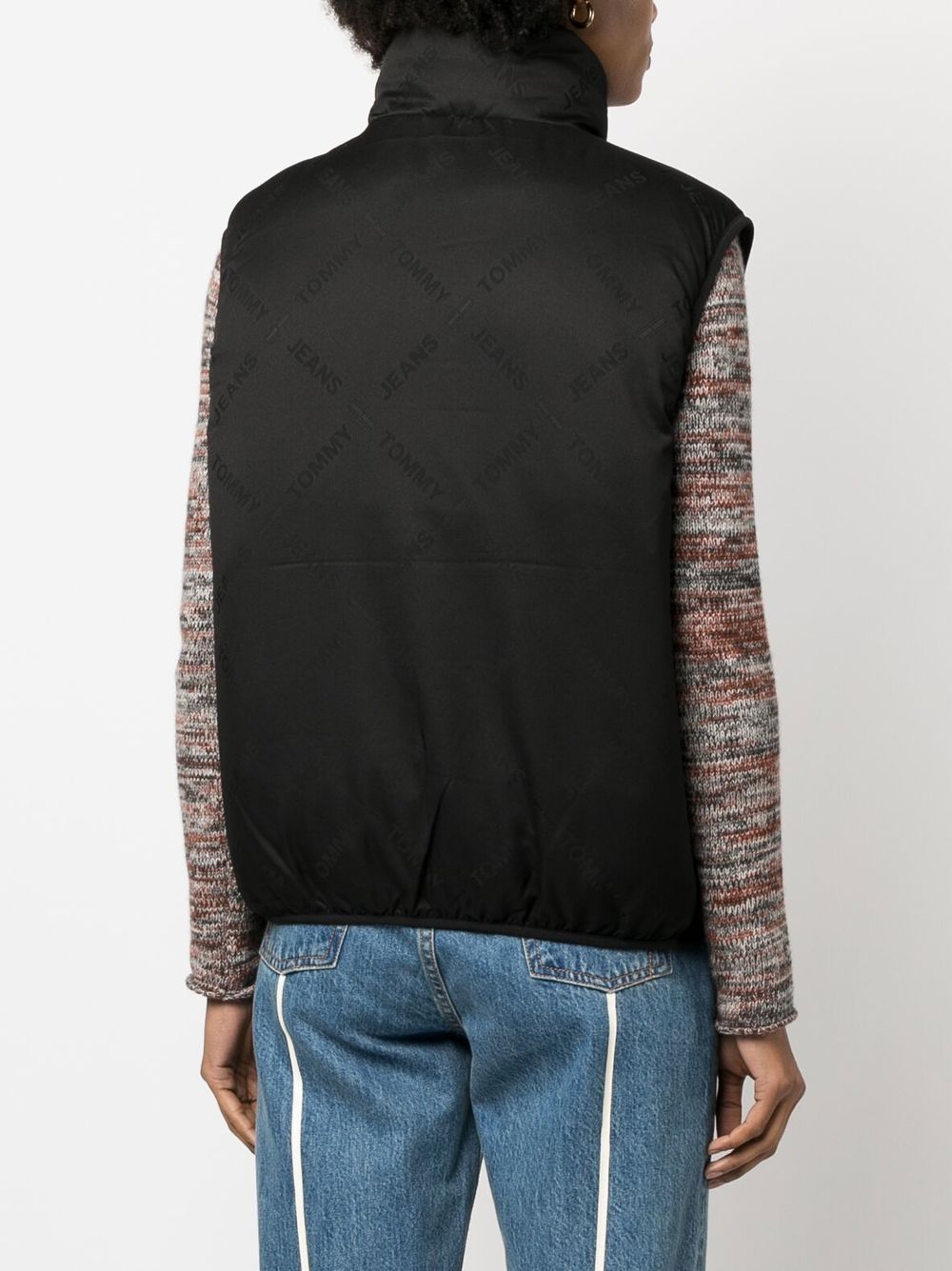 TJW REVERSE MONOGRAM PUFFER VEST