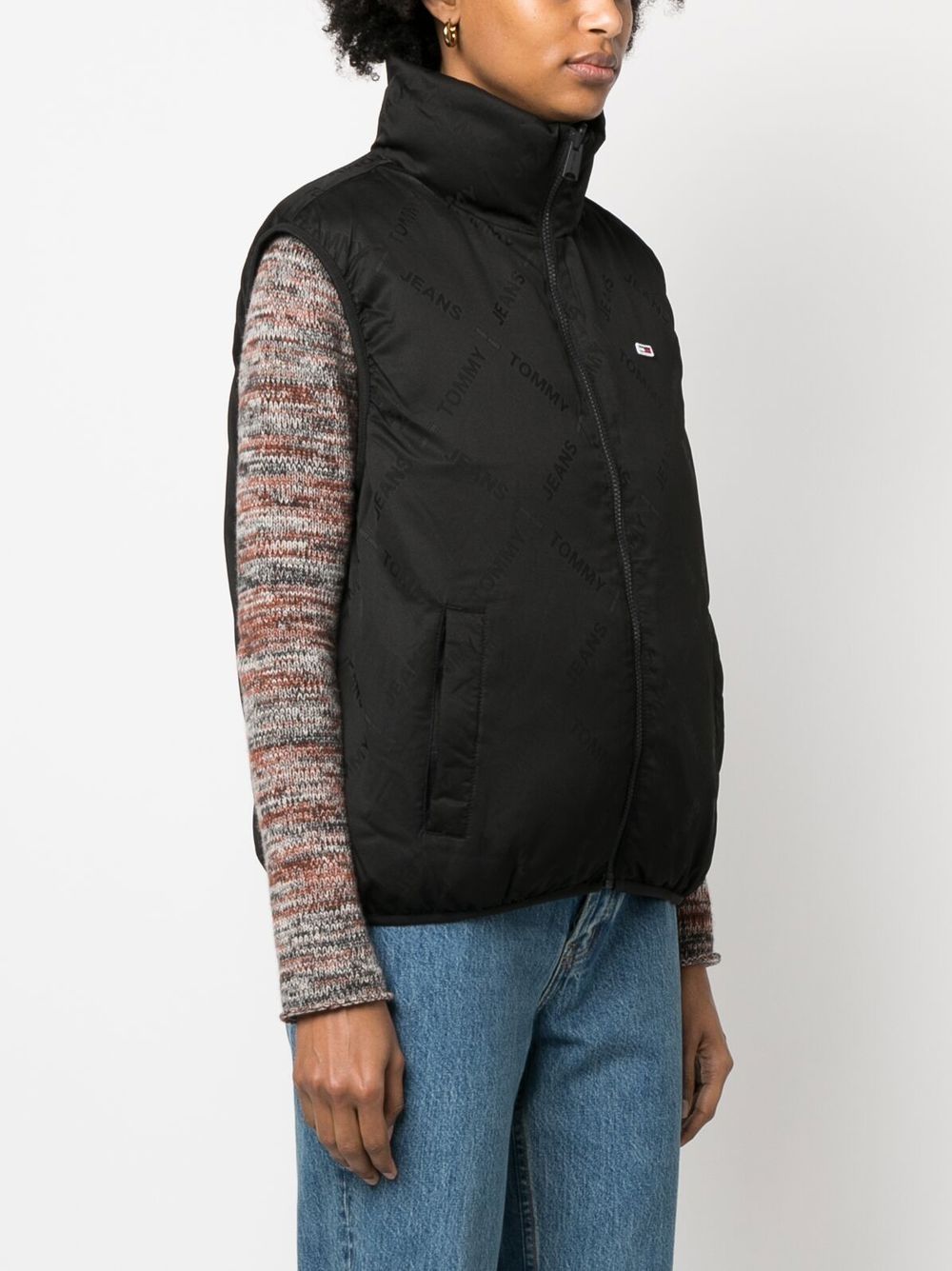 TJW REVERSE MONOGRAM PUFFER VEST