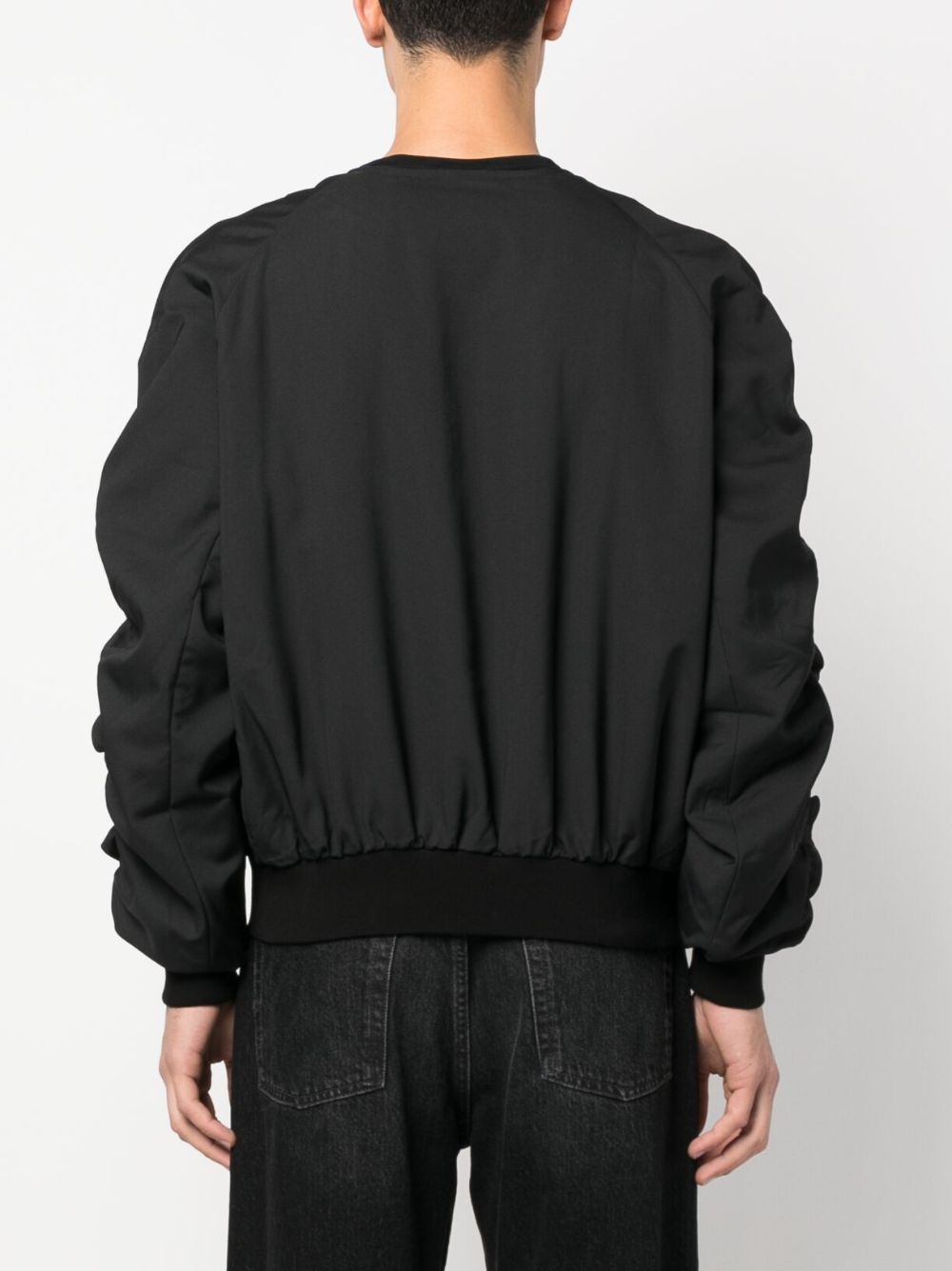 BOMBER WITH RUFFLED SLEEVE