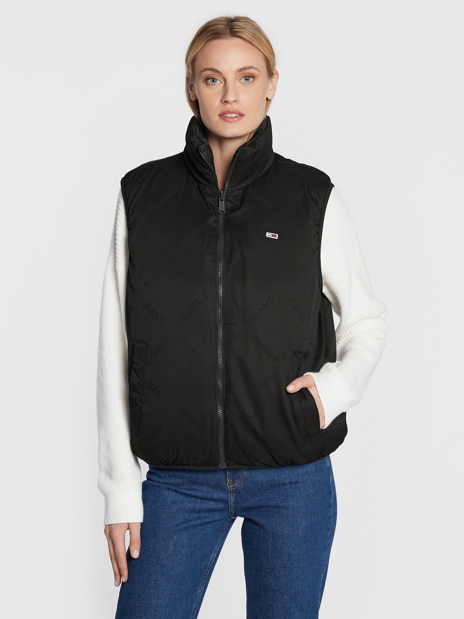 TJW REVERSE MONOGRAM PUFFER VEST