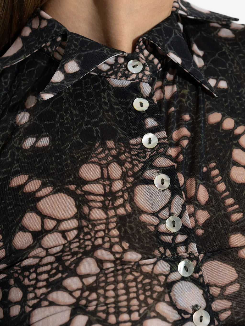 spiky printed distressed knit