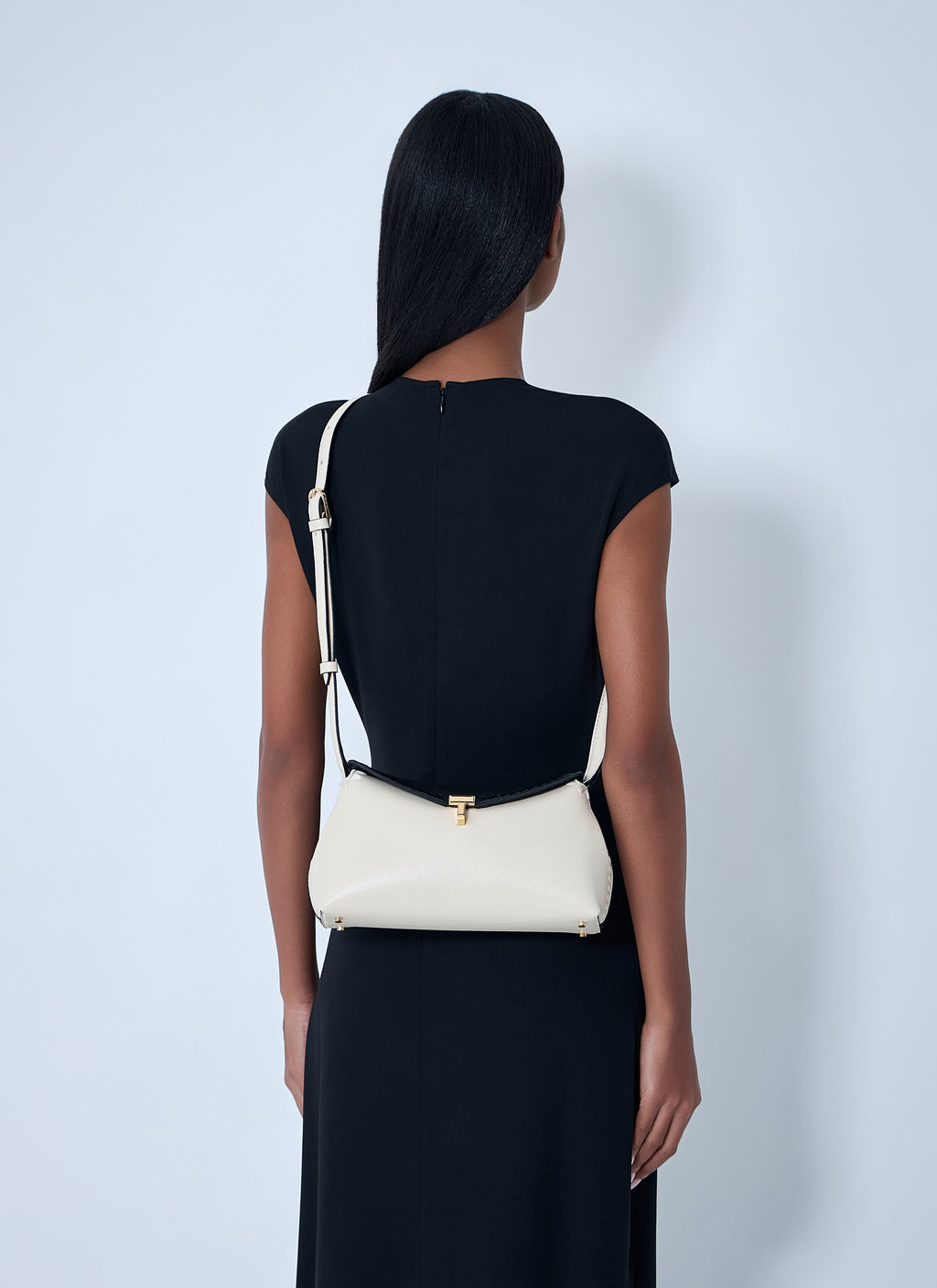 T-Lock Embroidered Leather Clutch Bag