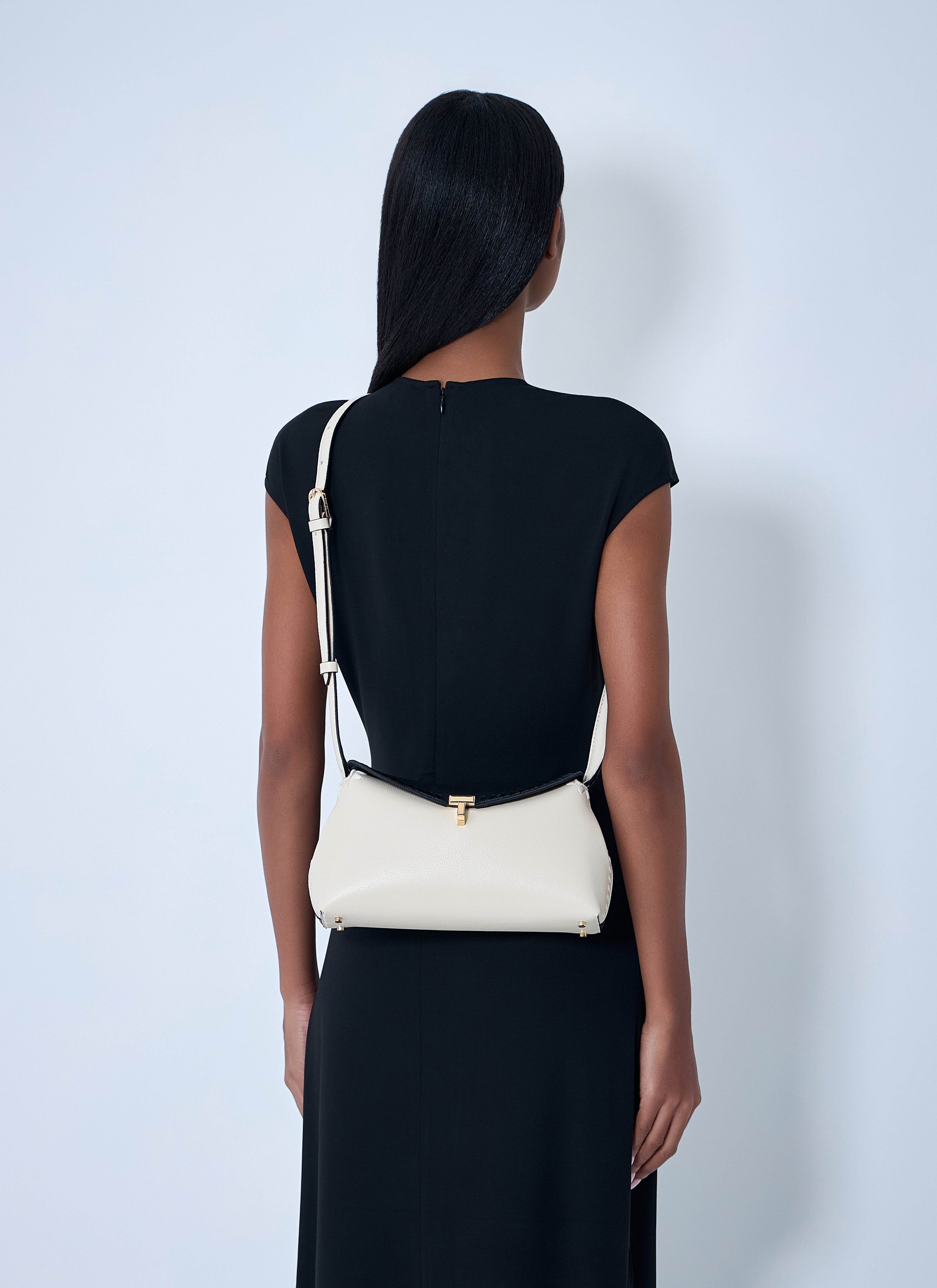 T-Lock Embroidered Leather Clutch Bag