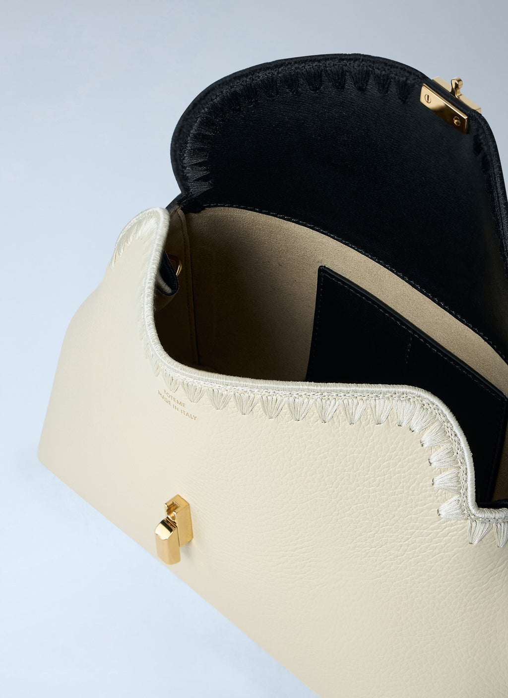 T-Lock Embroidered Leather Clutch Bag