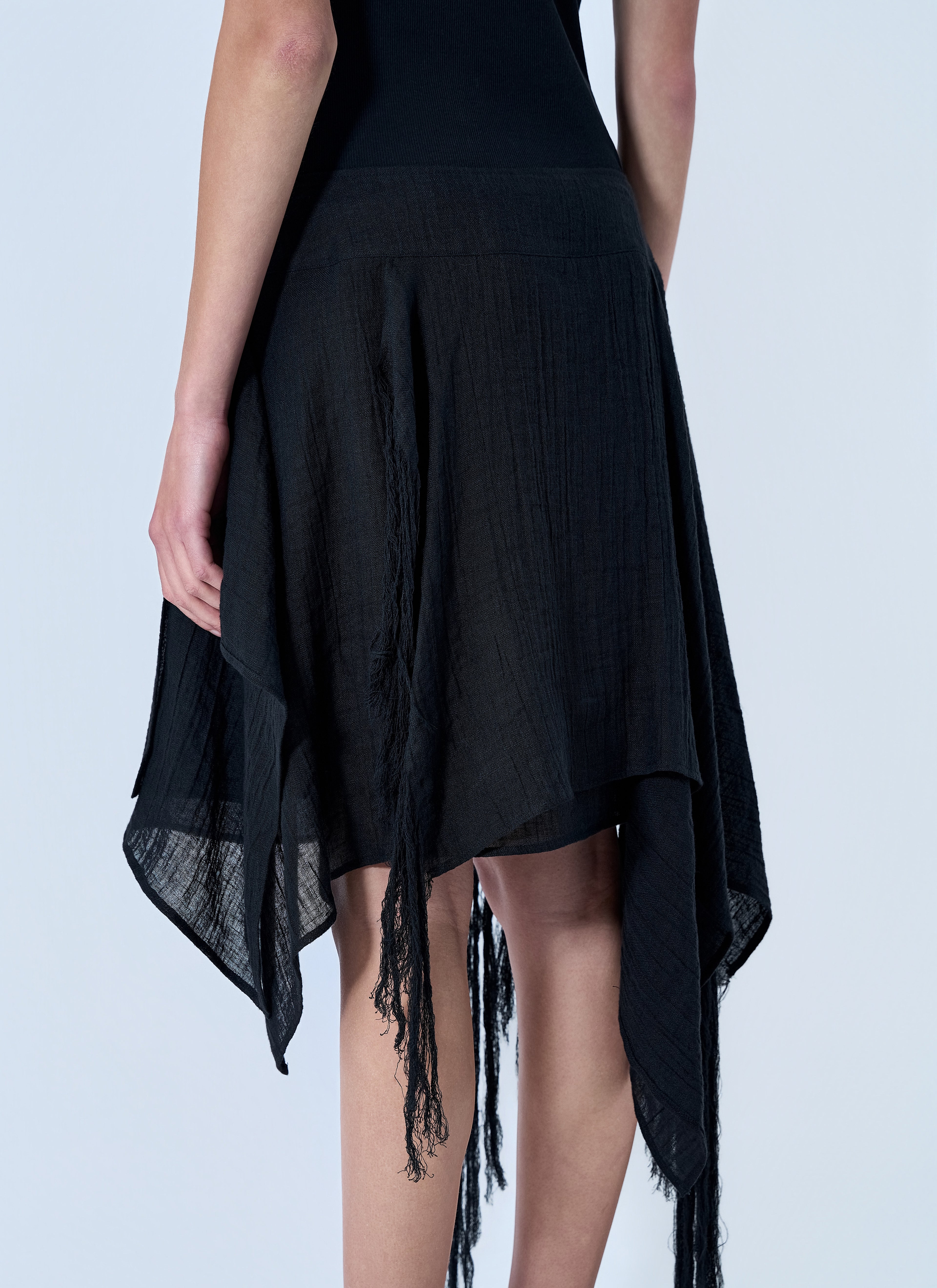 Asymmetric Fringe Skirt